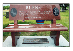PIcture of granite cremation bench also called cremation niche bench or cremation memorial bench designed by the Iowa Memorial Granite Company for an Iowa family. It was set in an Iowa cemetery.