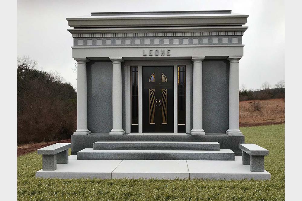 Private family mausoleum with ornate roof detail